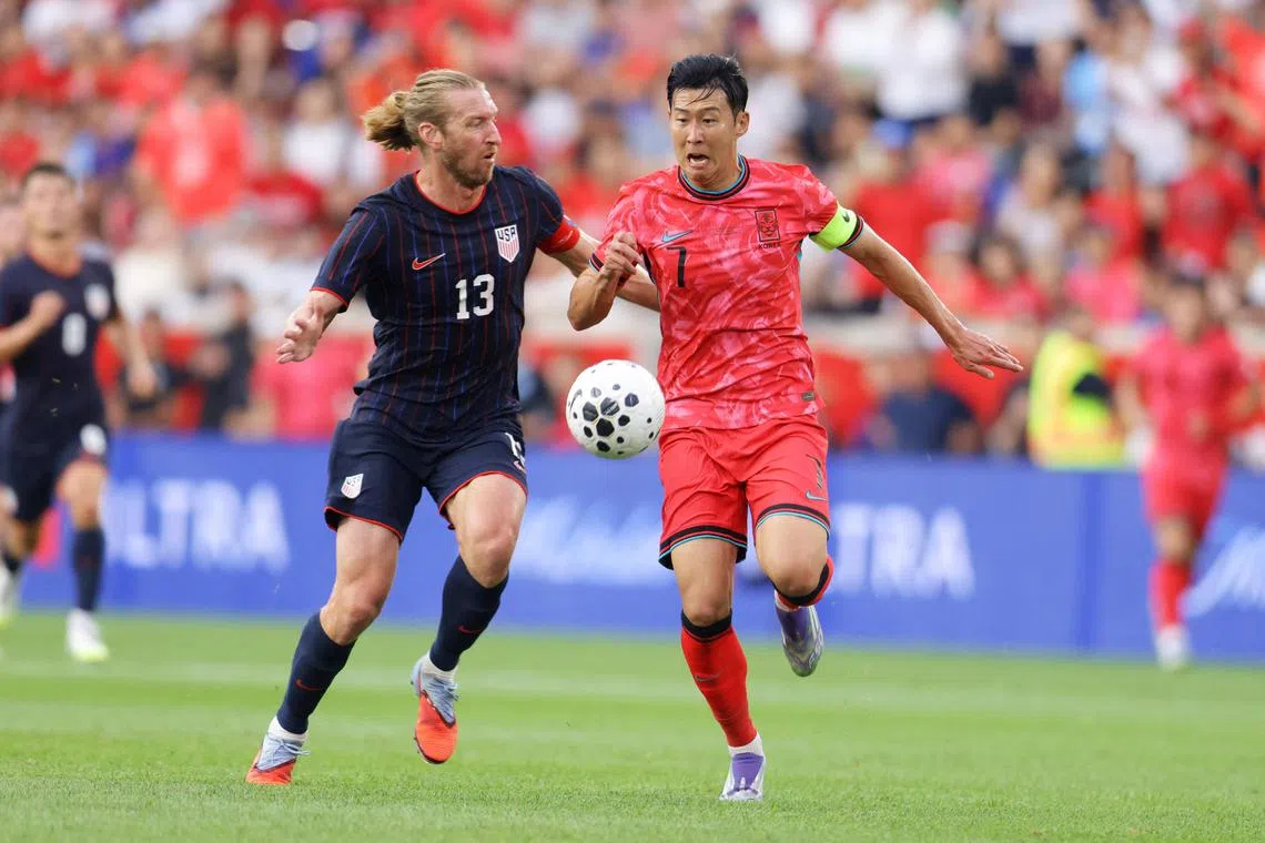 South Korea's Son Heung-min and Tim Ream of the United States vying for the ball during a friendly at the Sports Illustrated Stadium in Harrison, New Jersey on Sept 6, 2025. Son had a goal and an assist in his side's 2-0 win.