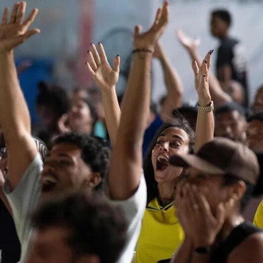 Brazilian football team fans watching the FIFA World Cup match between Brazil and Morocco on June 13 at the Estudio 50, in Havana. 