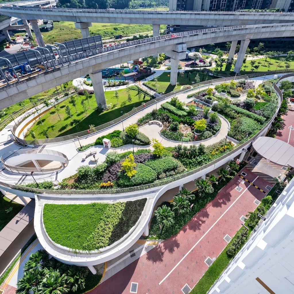 Two Jurong Region Line viaducts run through Garden Bloom @ Tengah’s common green area, where home-grown builder Chiu Teng Construction had to build facilities while rail works were under way.