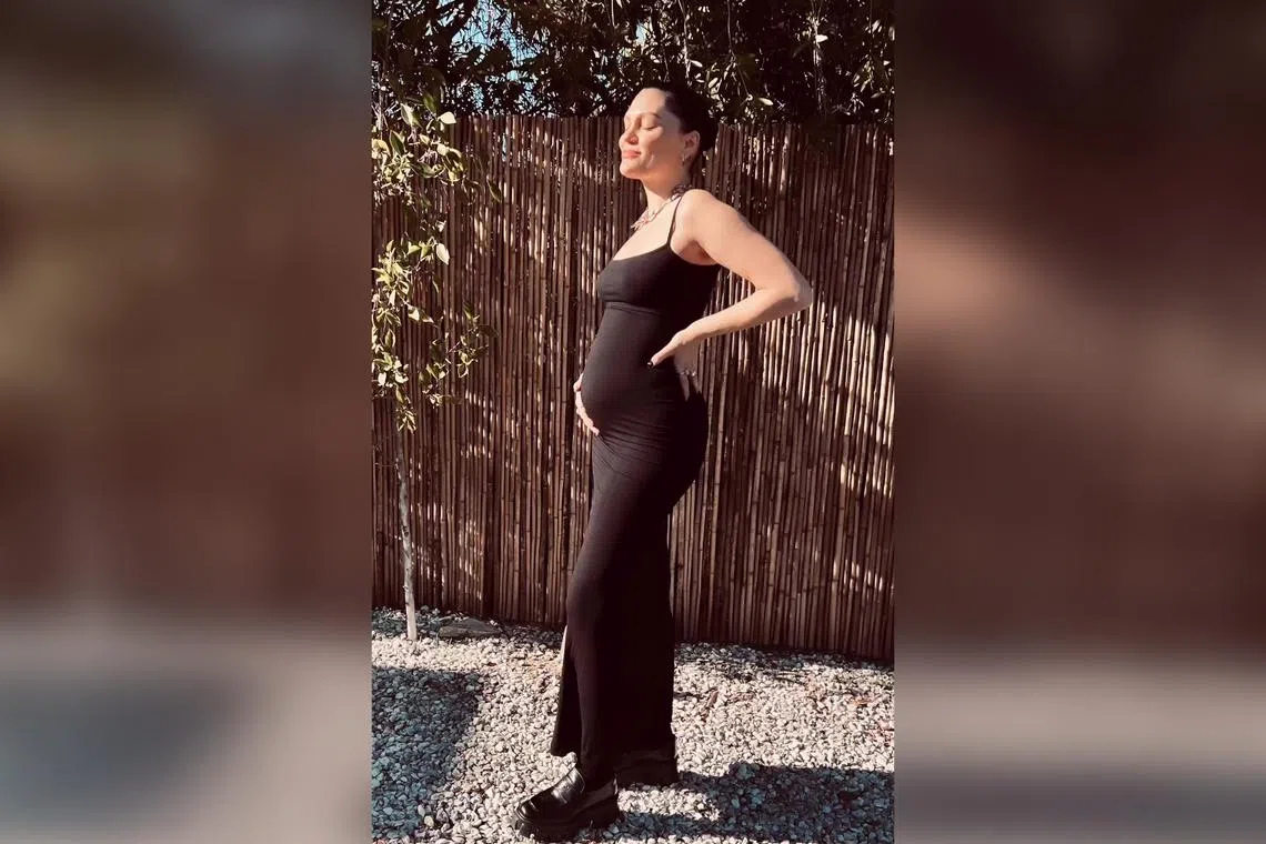 Jessie J shared a video slideshow that included snaps of her fledgling baby bump, ultrasound scans and a positive pregnancy test.