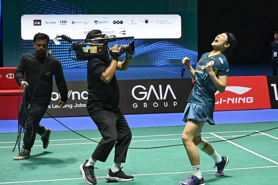 KFF Singapore Badminton Open finals:
South Korea's An Se-young in jubilation after winning 2-1 against China's Chen Yufei in the women's singles final on 2 June 2024 at Singapore Indoor Stadium .