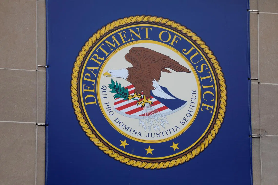 FILE PHOTO: The crest of the United States Department of Justice (DOJ) is seen at their headquarters in Washington, D.C., U.S., May 10, 2021. REUTERS/Andrew Kelly/File photo