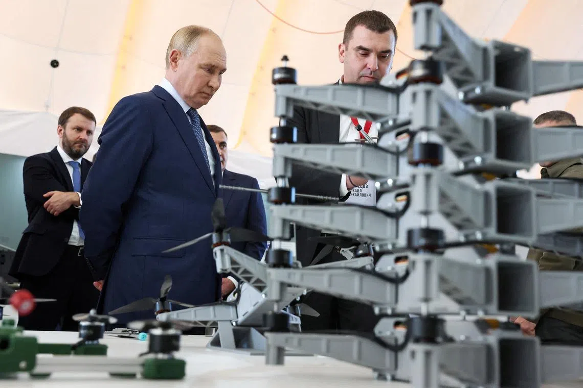 FILE PHOTO: Russia's President Vladimir Putin visits a drone production facility of the the Special Technology Centre in Saint Petersburg, Russia September 19, 2024. Sputnik/Valery Sharifulin/Pool via REUTERS/File Photo
