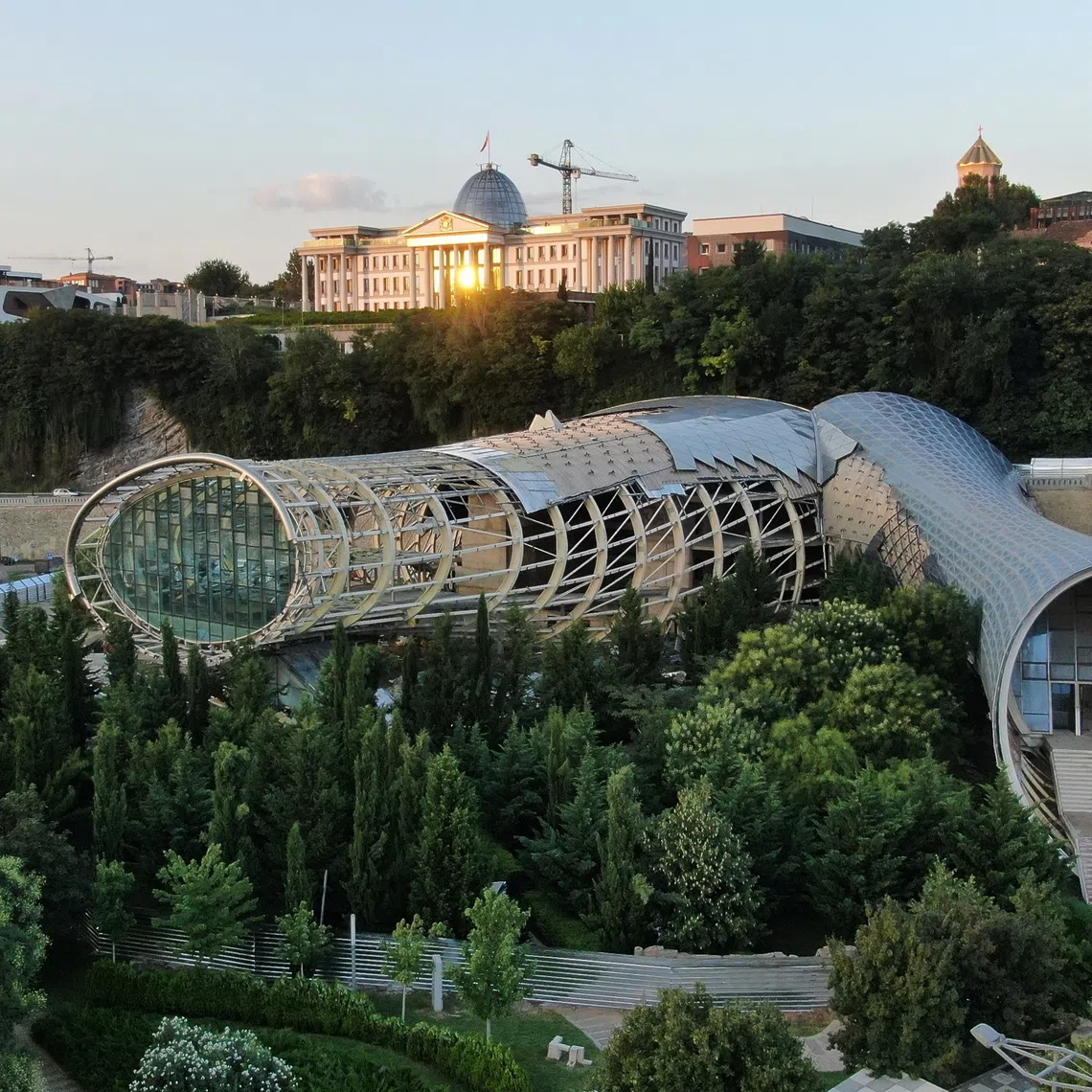 A drone view of the complex known as \"Rike Tubes\", designed by the Italian architectural firm Studio Fuksas and built to house the Rike Park Music Theatre and Exhibition Hall, but never put into use and now being demolished, in Tbilisi, Georgia August 21, 2026. REUTERS/Irakli Gedenidze