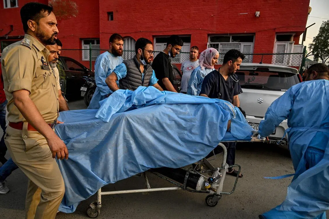 An injured tourist is taken to a hospital  following the April 22 attack, in which men were targeted.