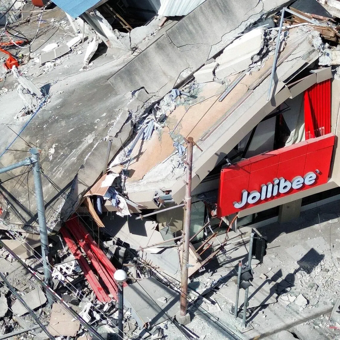 A drone view shows a collapsed building after a magnitude 7.8 quake in General Santos, Mindanao island, Philippines, on June 8.