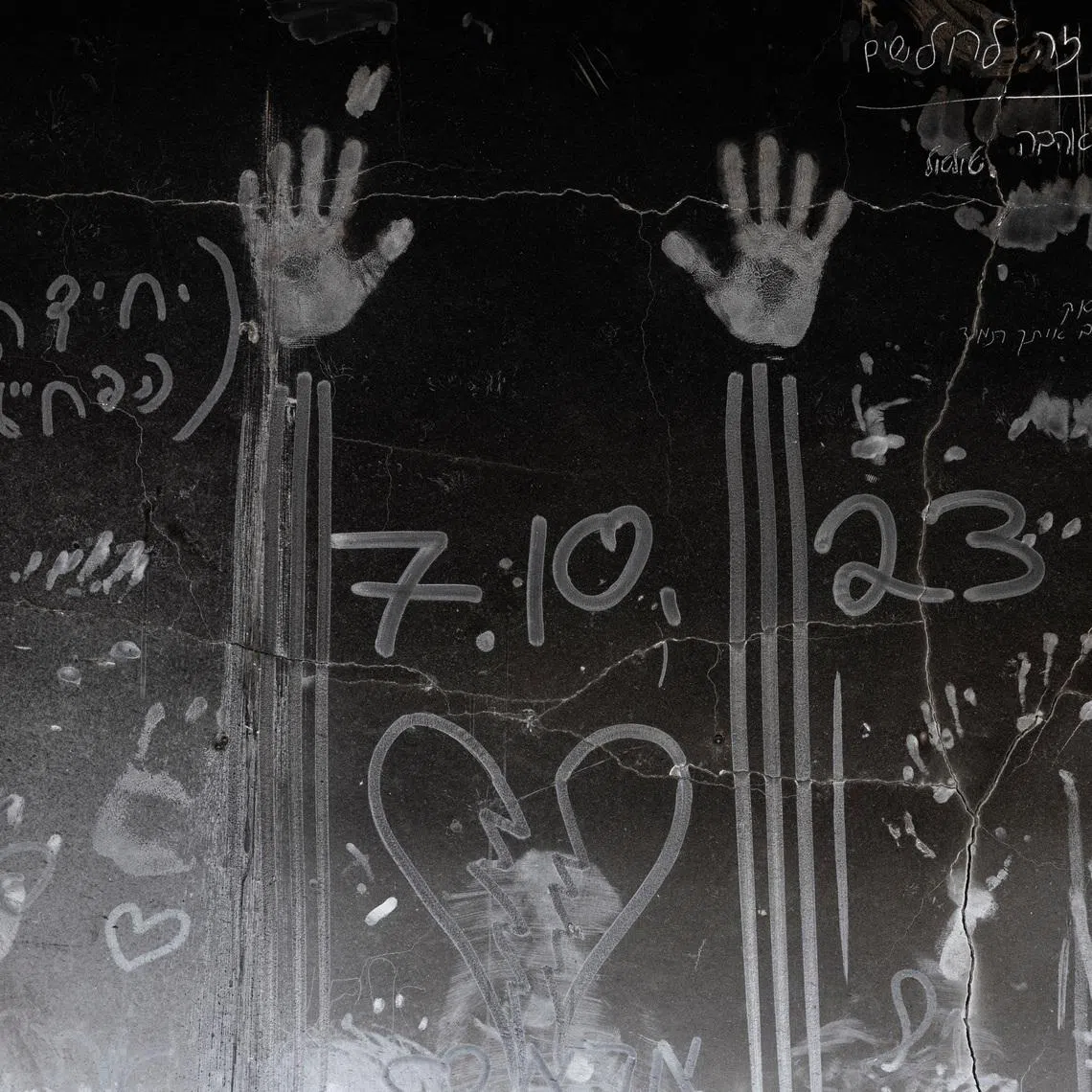 Hand prints and other markings made in the soot on a wall are seen, nearly a year since the deadly October 7 attack by Hamas, in Kibbutz Beeri, southern Israel, September 15, 2024. REUTERS/Amir Cohen