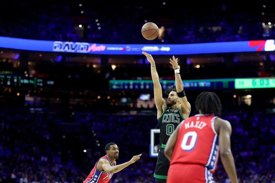 Jayson Tatum shoots against the Philadelphia 76ers during the first quarter in Game 3 of the Eastern Conference semi-finals on Friday. 