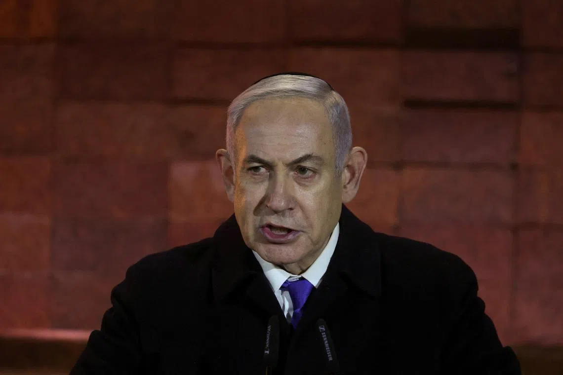 FILE PHOTO: Israeli Prime Minister Benjamin Netanyahu speaks during the opening ceremony marking Israel's national Holocaust Remembrance Day at Yad Vashem, the World Holocaust Remembrance Center, in Jerusalem May 5, 2024. REUTERS/Ronen Zvulun/File Photo