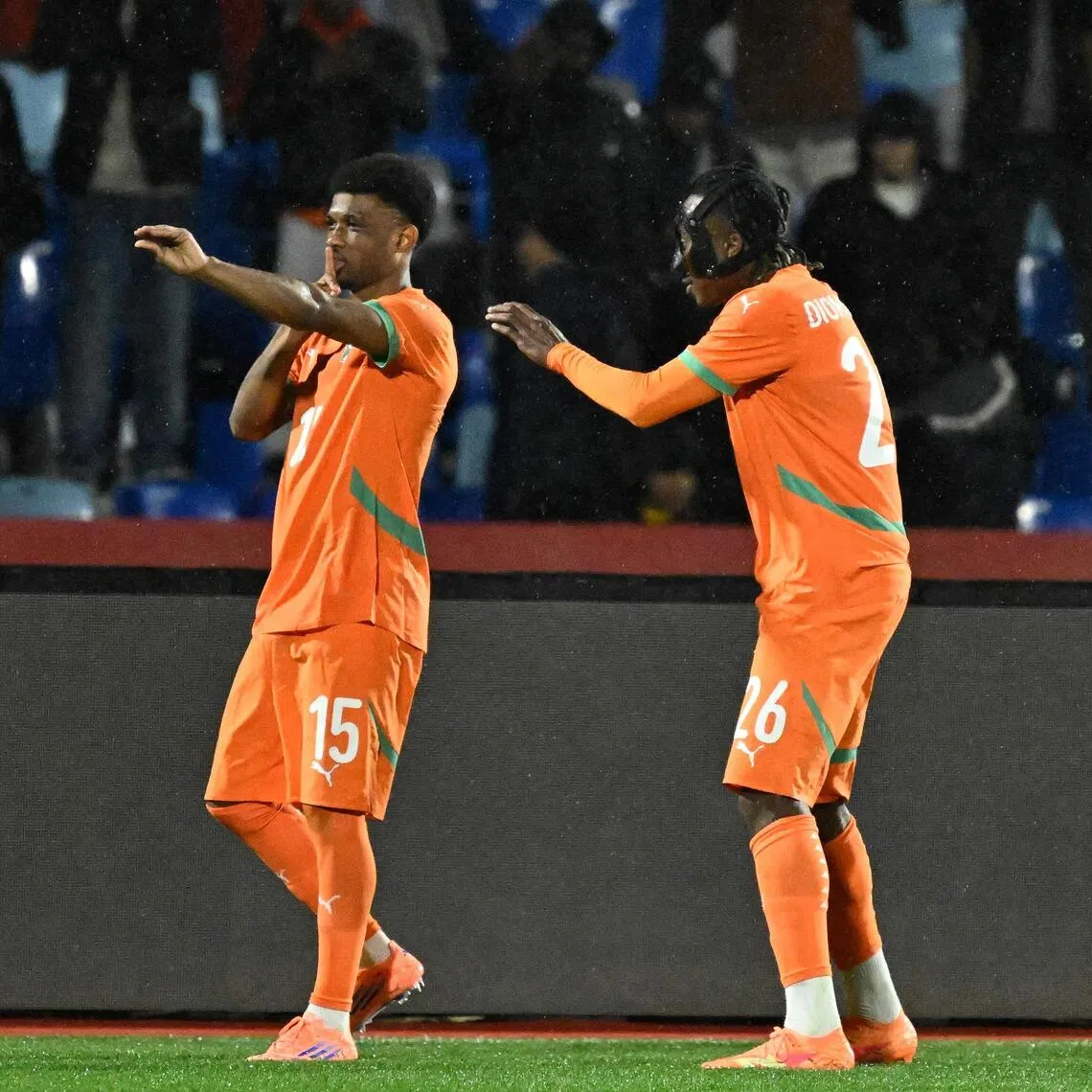 Ivory Coast forward Amad Diallo (left) celebrates scoring the only goal of the match with teammate Yan Diomande.