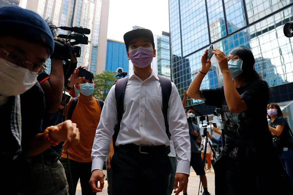 Tsang Chi-kin, a 19-year-old student, who was shot in the chest during a protest last year, arrives at the District Court to face charges of rioting, in Hong Kong, China October 8, 2020. REUTERS/Tyrone Siu/File Photo