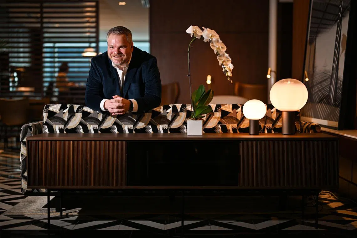 Mr Alexander Knight, 49, CEO of Whisky Cask Club, at his office in Capital Tower on Feb 17, 2023.
Me and My Money feature on Alexander Knight, CEO of Whisky Cask Club. The company, which started in 2021, was established to provide Singaporeans with a convenient platform to invest in Scottish whisky casks in Scotland - without leaving Singapore! The firm generates revenue through multiple sources, such as single cask sales, a MAS-approved whisky cask fund and various membership tiers.
(ST PHOTO: LIM YAOHUI)