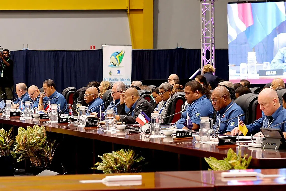 Leaders of Pacific Islands nations attend the opening session of the leaders’ plenary at the Pacific Islands Forum summit in Honiara, Solomon Islands.