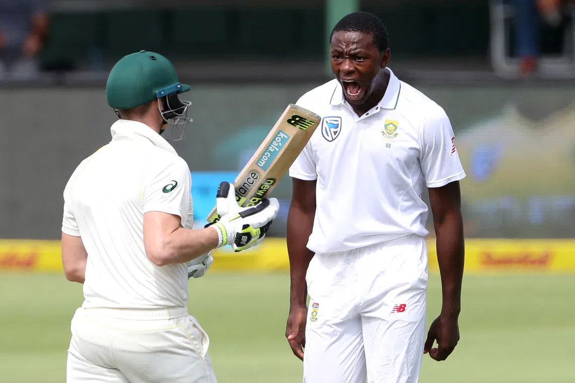 FILE PHOTO: Cricket - South Africa vs Australia - Second Test - St George's Park, Port Elizabeth, South Africa - March 9, 2018   South Africa’s Kagiso Rabada celebrates taking the wicket of Australia’s Steve Smith   REUTERS/Mike Hutchings/File Photo
