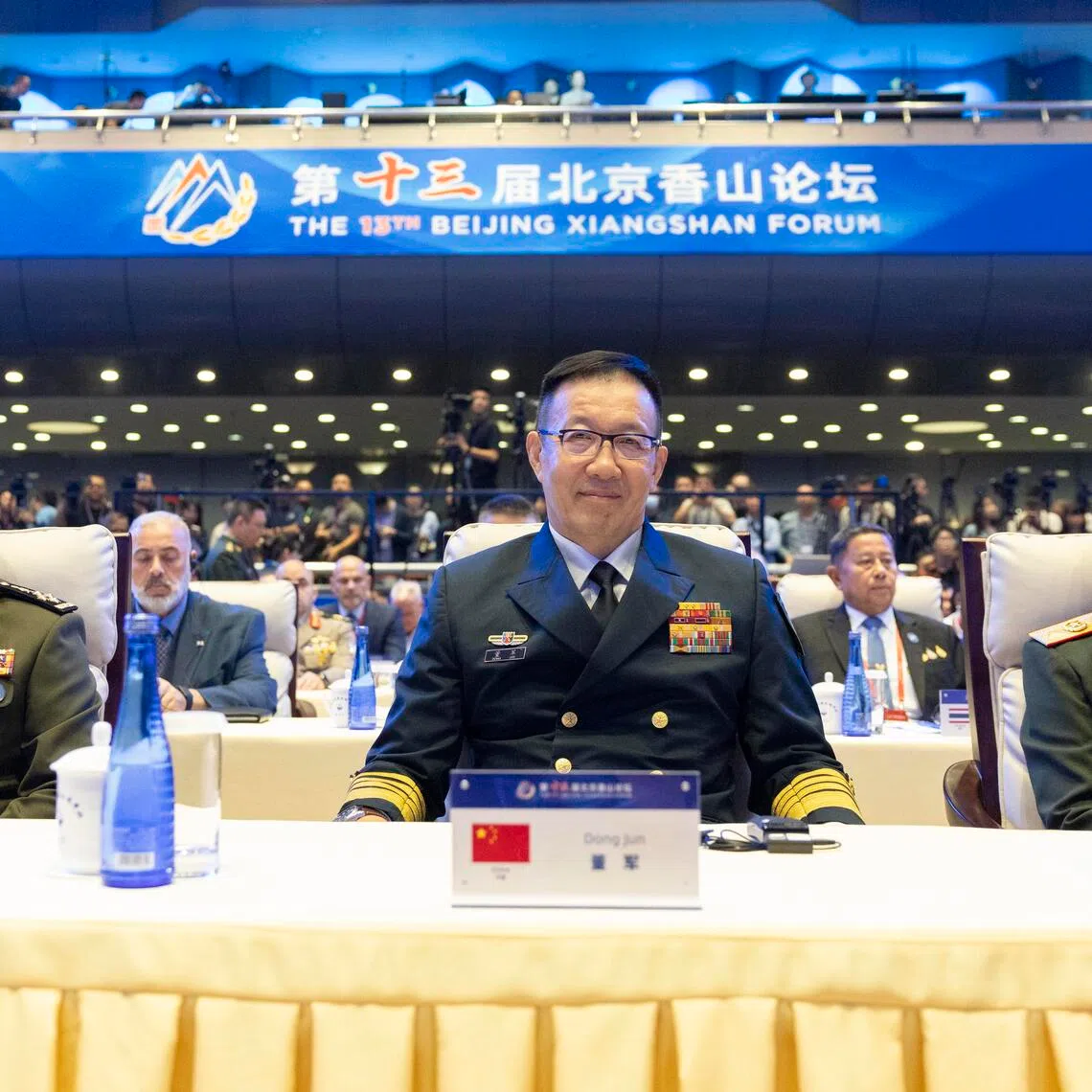 China’s Minister of National Defence Dong Jun (centre), together with Laos’ Defence Minister Khamlieng Outhakaisone (right) and Cambodia’s Deputy Prime Minister and Minister of National Defence Tea Seiha (left), pose for photographs before the opening ceremony of the 13th Beijing Xiangshan Forum in Beijing, China, on Sept 16.