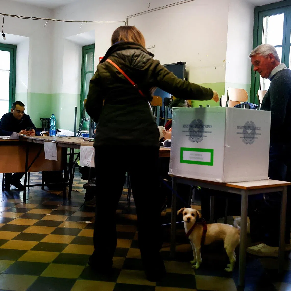 People vote during a referendum on reforms to Italy’s justice system in Rome, Italy, March 22, 2026. REUTERS/Vincenzo Livieri