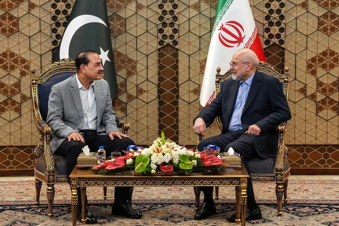 Iranian Parliament Speaker Mohammad Bagher Ghalibaf meets with chief of Defence Forces of Pakistan, Field Marshal Asim Munir, in Tehran, Iran, May 23, 2026. Iranian Parliament Speaker Office/WANA (West Asia News Agency)/Handout via REUTERS