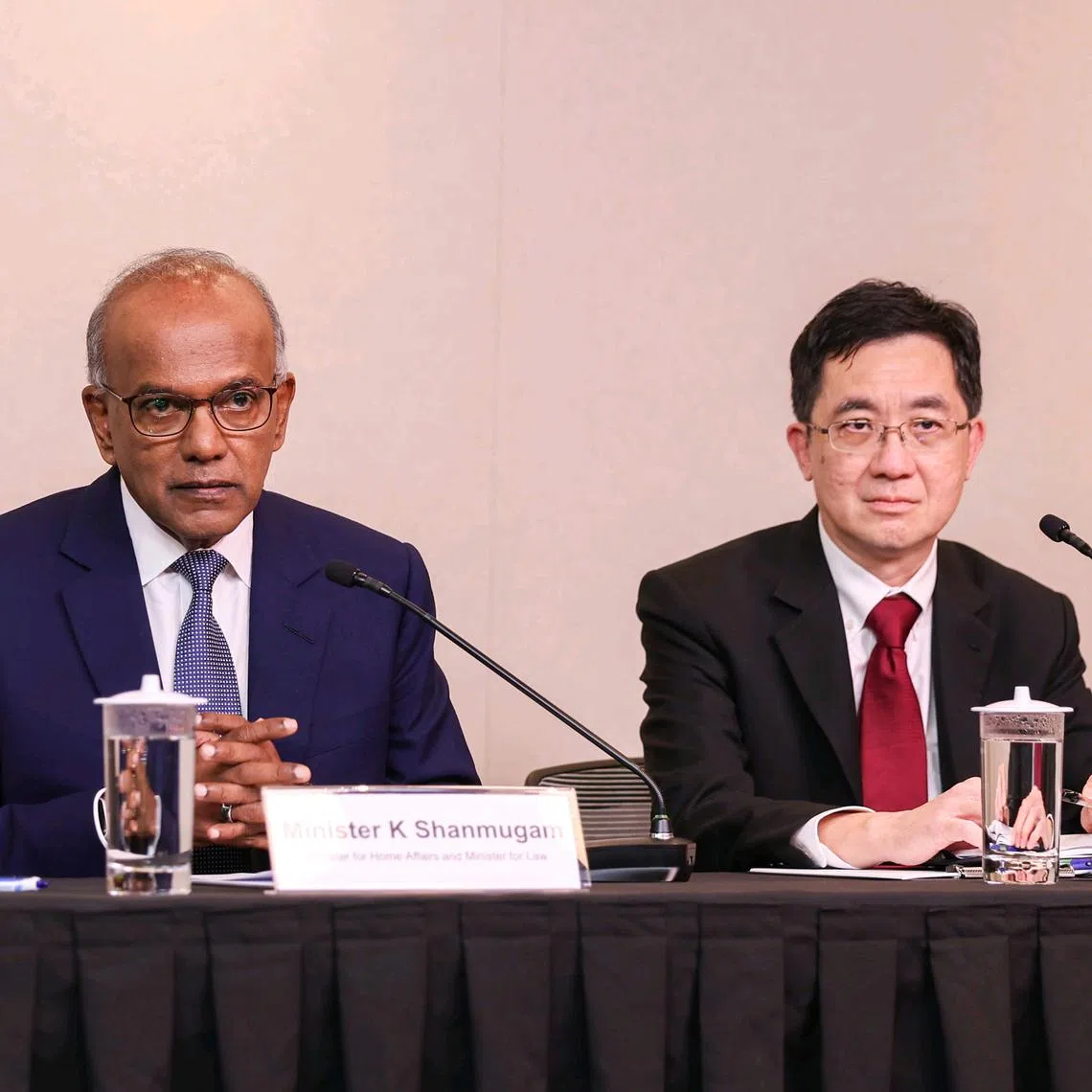 Law and Home Affairs Minister K. Shanmugam and Deputy Attorney-General Lionel Yee at a press conference on March 10 about the extradition request.