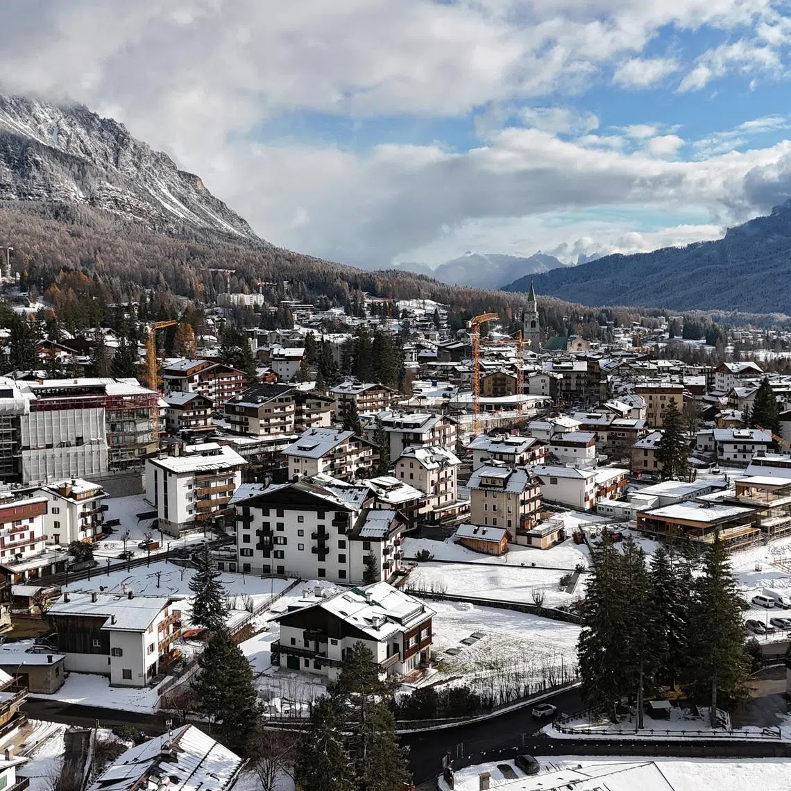 FILE PHOTO: Olympics - 2026 Milano-Cortina Winter Olympics -  A drone view shows Cortina, a host town of the Milano Cortina Winter Olympic Games 2026, in Cortina, Italy - November 21, 2025 REUTERS/Claudia Greco/File Photo