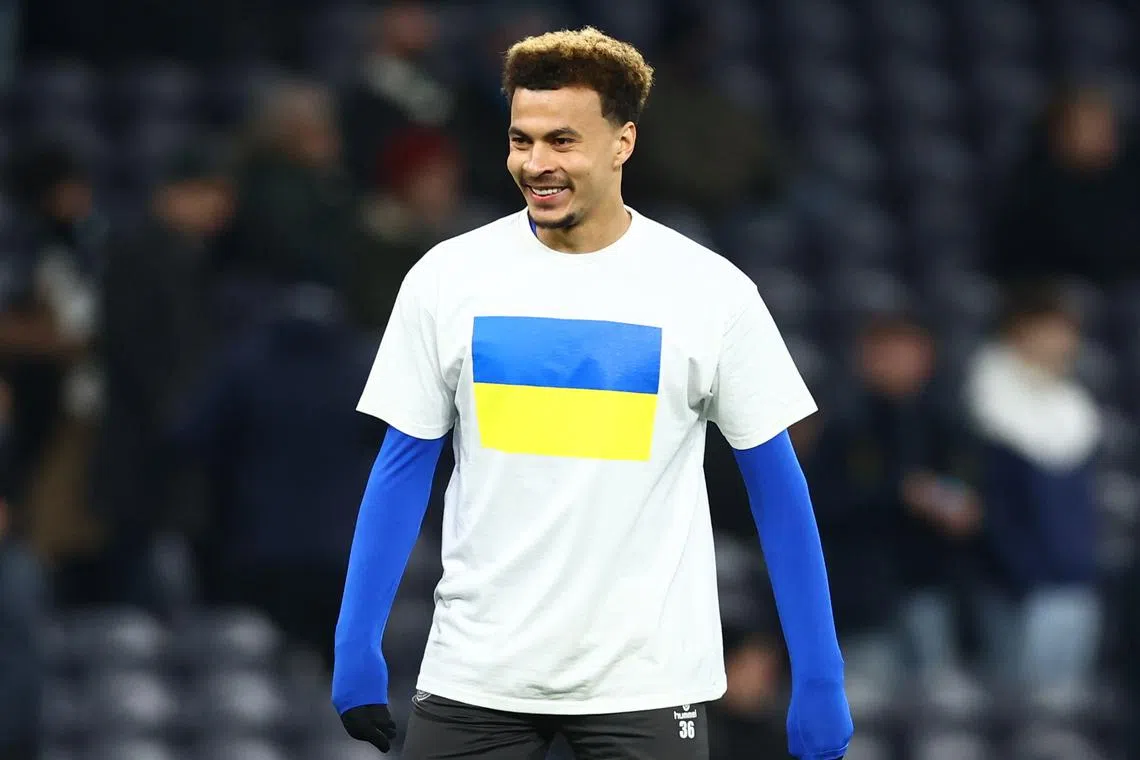 FILE PHOTO: Soccer Football - Premier League - Tottenham Hotspur v Everton - Tottenham Hotspur Stadium, London, Britain - March 7, 2022 Everton's Dele Alli wears a T-shirt in support of Ukraine amid Russia's invasion during the warm up before the match REUTERS/David Klein/File Photo
