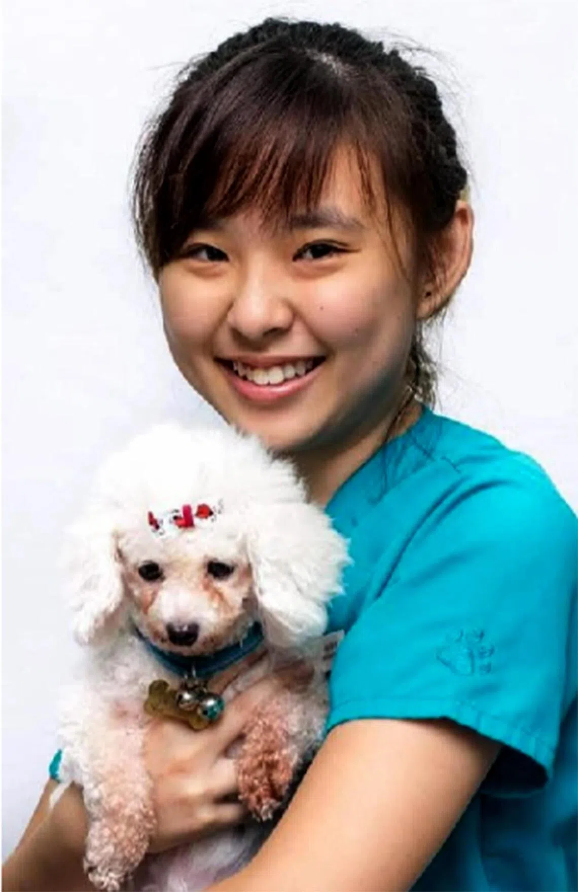 As both a vet nurse and a pet owner, Ang Xue Yi has navigated complex nursing care at home for her own dog, Shiro (pictured), and several foster rabbits.