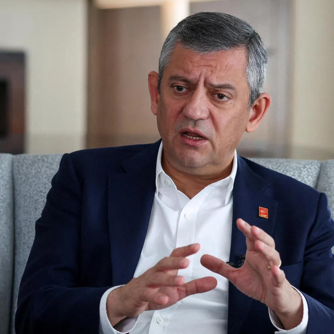 FILE PHOTO: Ozgur Ozel, leader of the main opposition Republican People's Party (CHP), speaks during an interview with Reuters in Istanbul, Turkey, March 11, 2026. REUTERS/Murad Sezer/File Photo