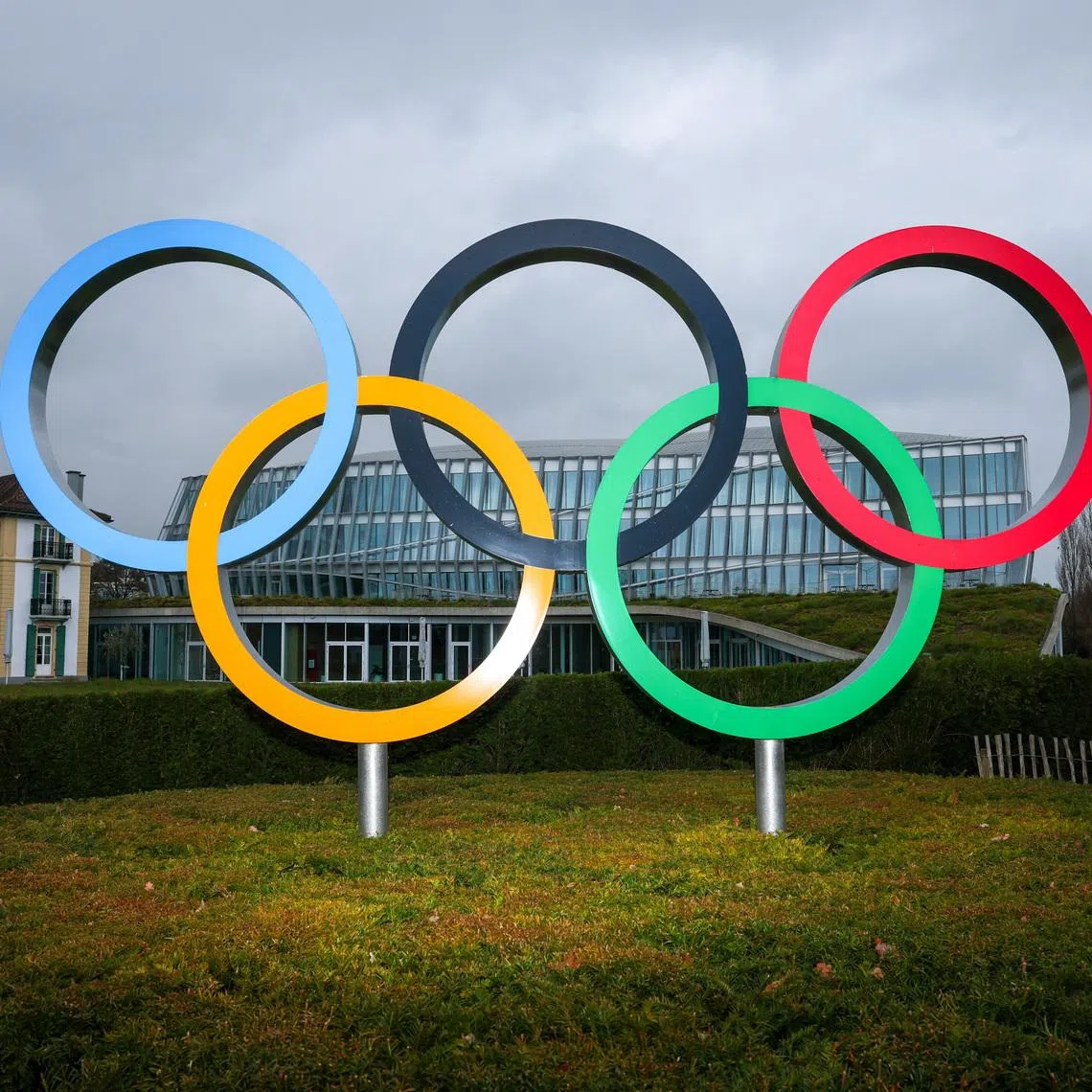 Olympic rings are pictured outside the International Olympic Committee (IOC) during an Executive Board meeting at the Olympic House in Lausanne, Switzerland, March 26, 2026. REUTERS/Denis Balibouse