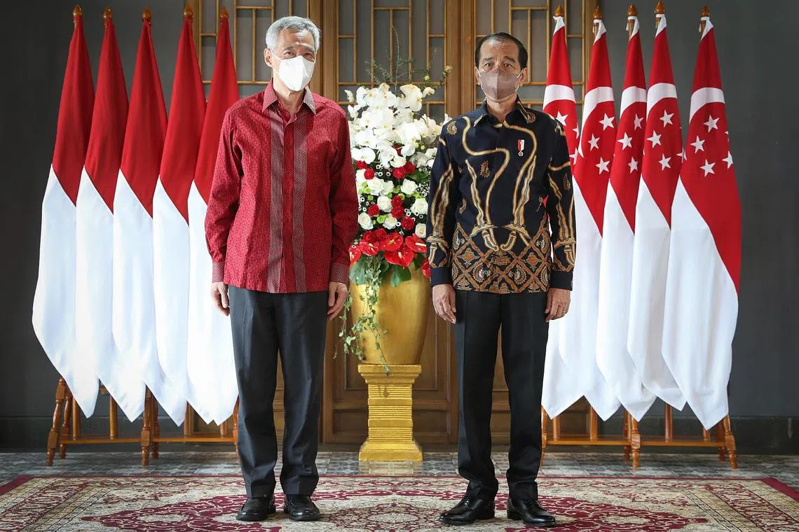 Singapore PM Lee Hsien Loong and Indonesia President Joko Widodo reaffirmed their commitment to the agreements at the Leaders' Retreat on Jan 25, 2022.