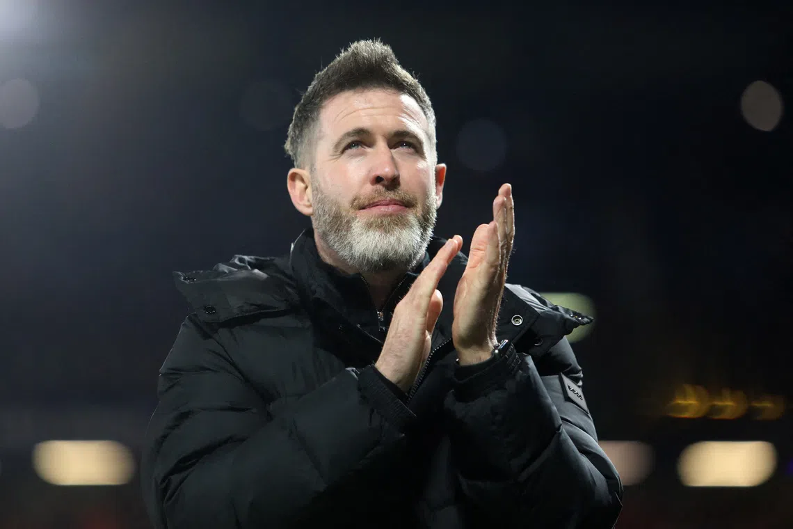 Soccer Football - UEFA Conference League - Sparta Prague v Shamrock Rovers - epet ARENA, Prague, Czech Republic - October 2, 2025 Shamrock Rovers manager Stephen Bradley applauds fans after the match REUTERS/Eva Korinkova