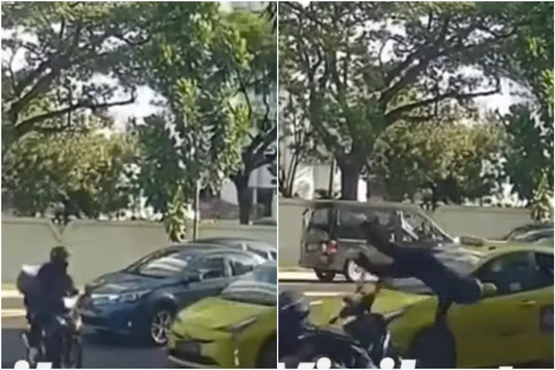 In a video posted by SG Road Vigilante, a motorcyclist was seen turning right when a yellow ComfortDelGro taxi collided into him.