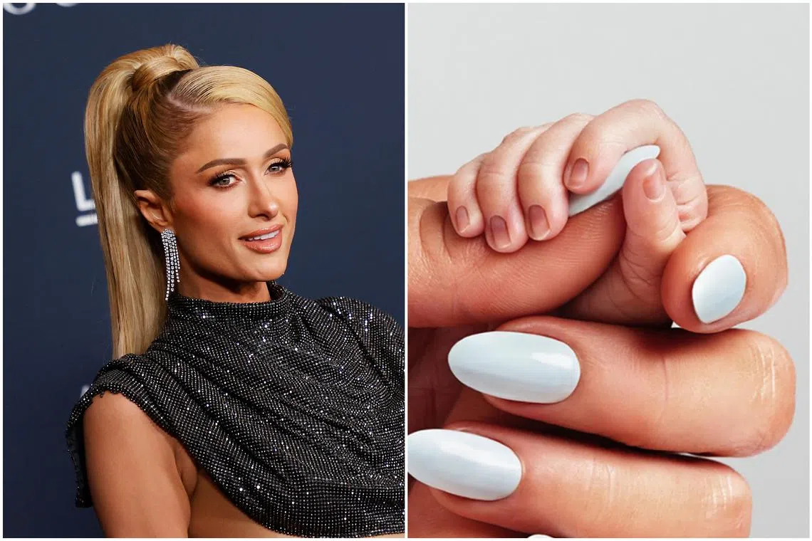 Paris Hilton posted a photo on social media of what appeared to be her newborn baby grasping her thumb.
