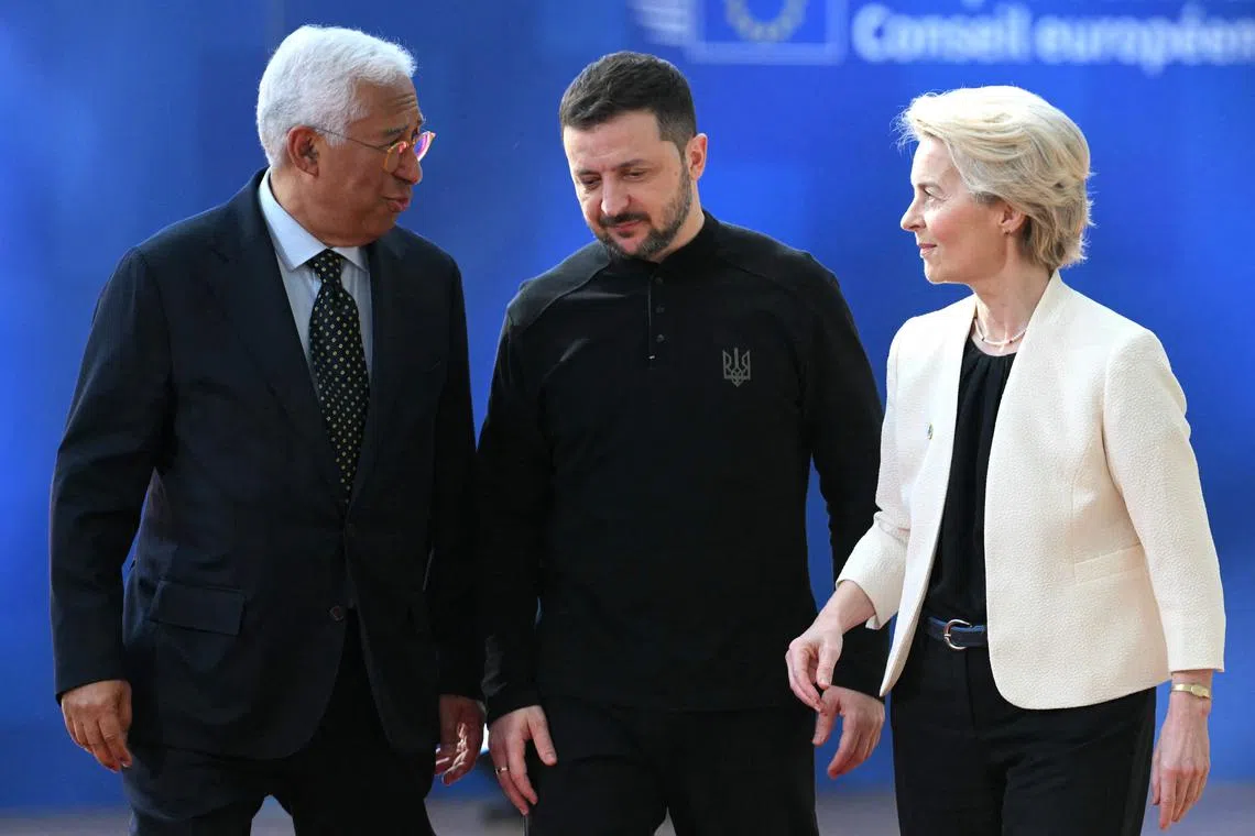 European Council President Antonio Costa (L) and European Commission President Ursula von der Leyen (R) greet Ukraine's President Volodymyr Zelensky as he arrives at the Special European Council to discuss continued support for Ukraine and European defence at the EU headquarters in Brussels on March 6, 2025. European Union leaders hold emergency talks in Brussels gathering as the Trump administration upends traditional alliances and retracts wartime backing of Ukraine. The summit brings all 27 EU leaders together for the first time since the explosive meeting between US and Ukraine presidents on February 28, 2025, with US military aid and intelligence sharing since suspended. (Photo by NICOLAS TUCAT / AFP)