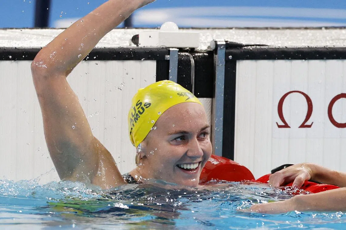 Australia's Ariarne Titmus celebrates winning gold in the women's 400 metres freestyle final.