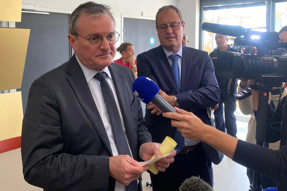 Pas-de-Calais prefect Jacques Billant (left) holding a press conference in Boulogne-sur-Mer, France, on Oct 5, following the deaths of several migrants who were attempting to cross the English Channel.