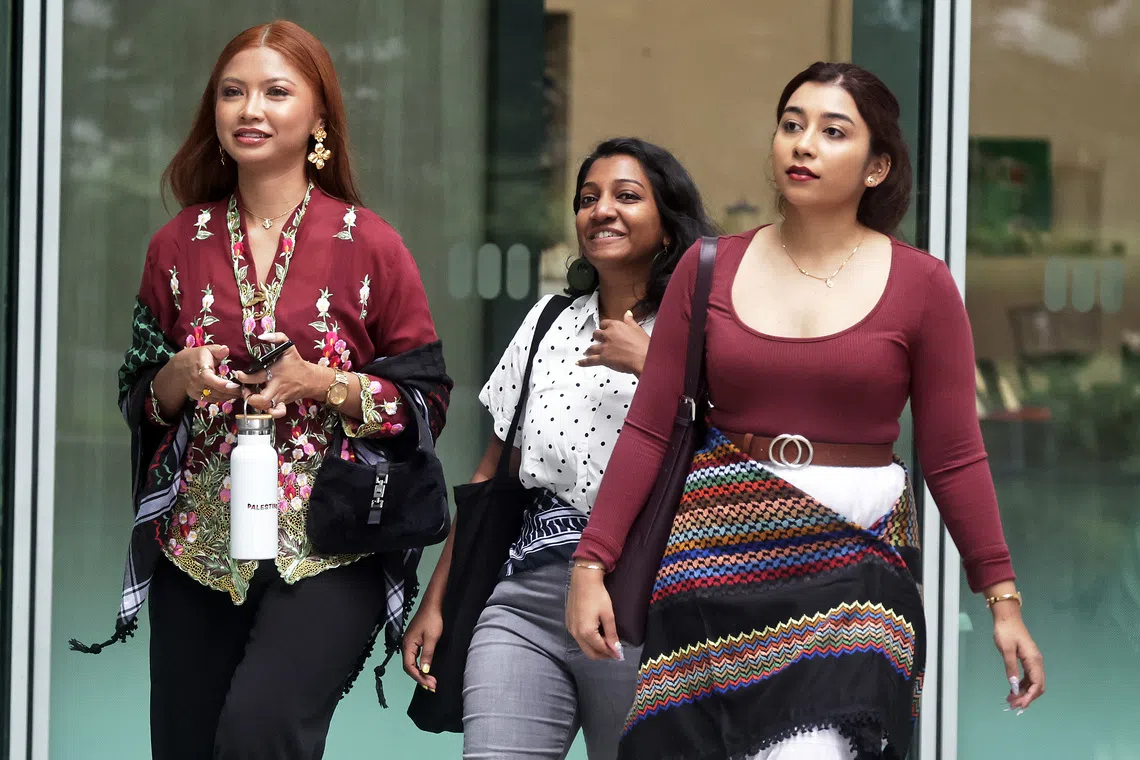 (From left) Ms Siti Amirah Binte Mohamed Asrori, Ms Annamalai Kokila Parvathi and Ms Mossammad Sobikun Nahar arriving at the State Courts on July 2.