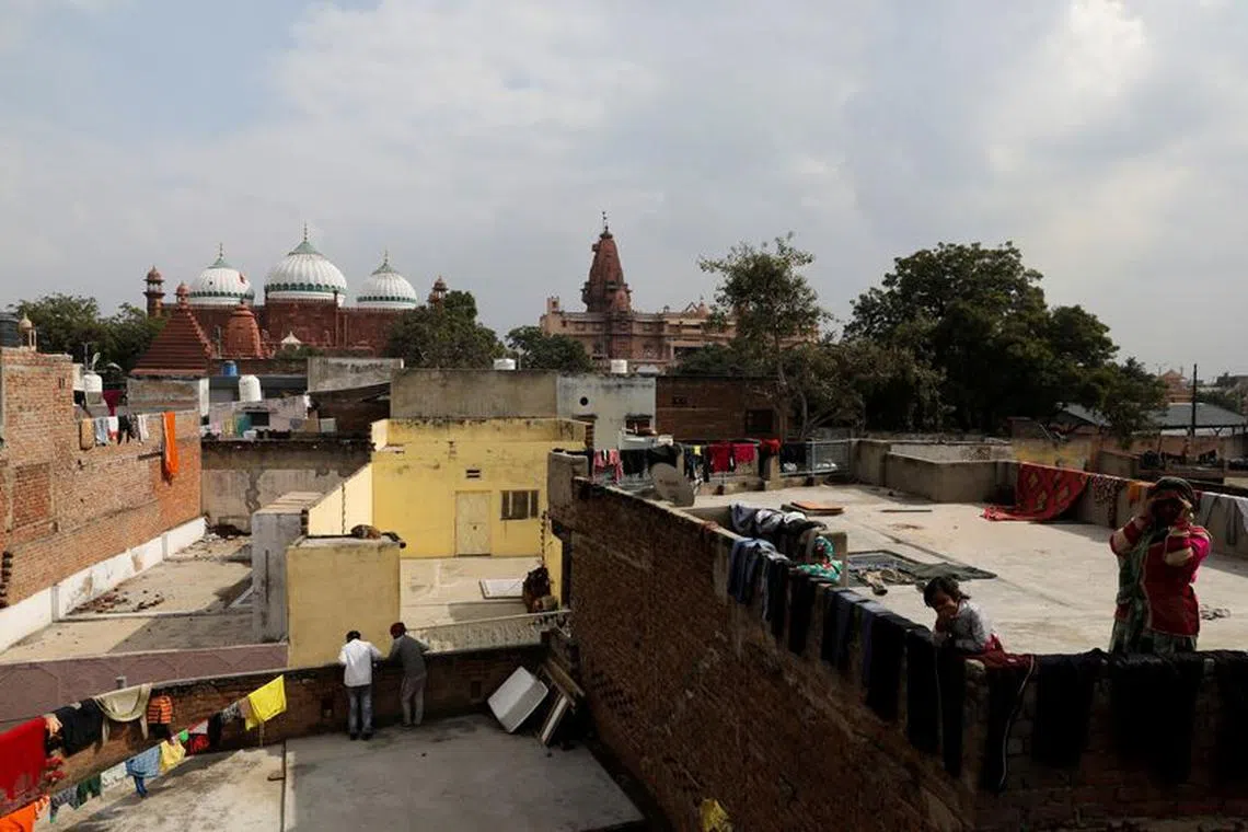FILE PHOTO: The Shahi Eidgah mosque and the Hindu temple are seen side-by-side in Mathura town, in the northern state of Uttar Pradesh, India, January 24, 2022. Picture taken on January 24, 2022. REUTERS/Anushree Fadnavis/File Photo