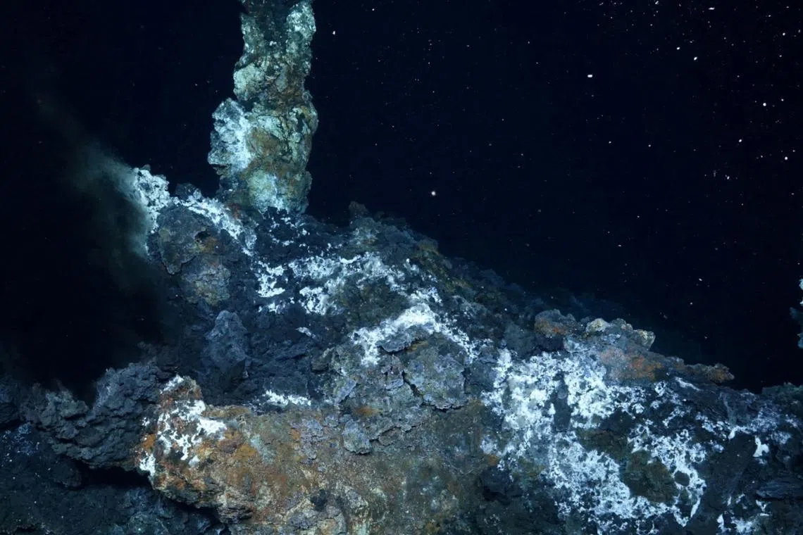Deep-sea mining involves sending a large robot to the seabed to hoover up lumps of metal, known as nodules.
