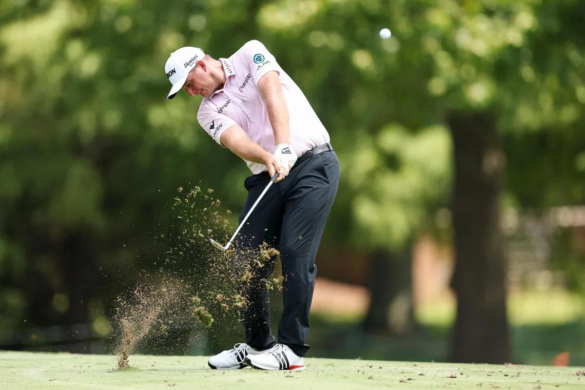 Sepp Straka of Austria hits an approach shot on the first hole during the final round of the FedEx St. Jude Championship.