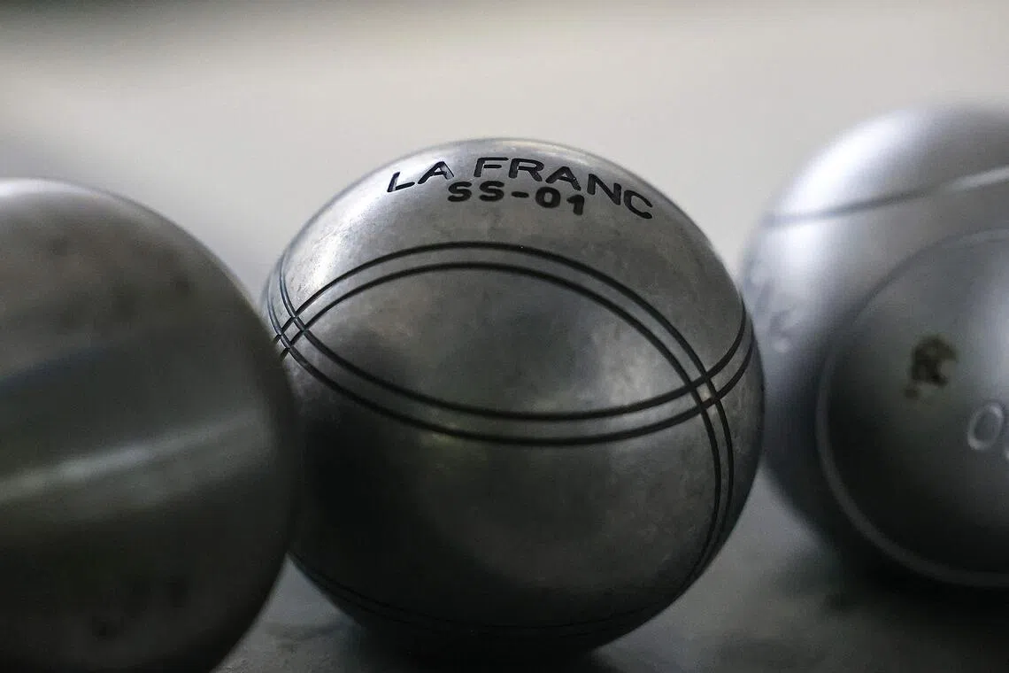 This photo taken on Nov 8, 2023 shows petanque balls at Football Thai (FBT) Factory Sporting Goods in Bangkok. Thailand's sports authority said on September 23, 2025 it would seek to "clarify misunderstandings" after the world governing body of petanque effectively barred the nation from hosting competition in the sport at the 2025 SEA Games.