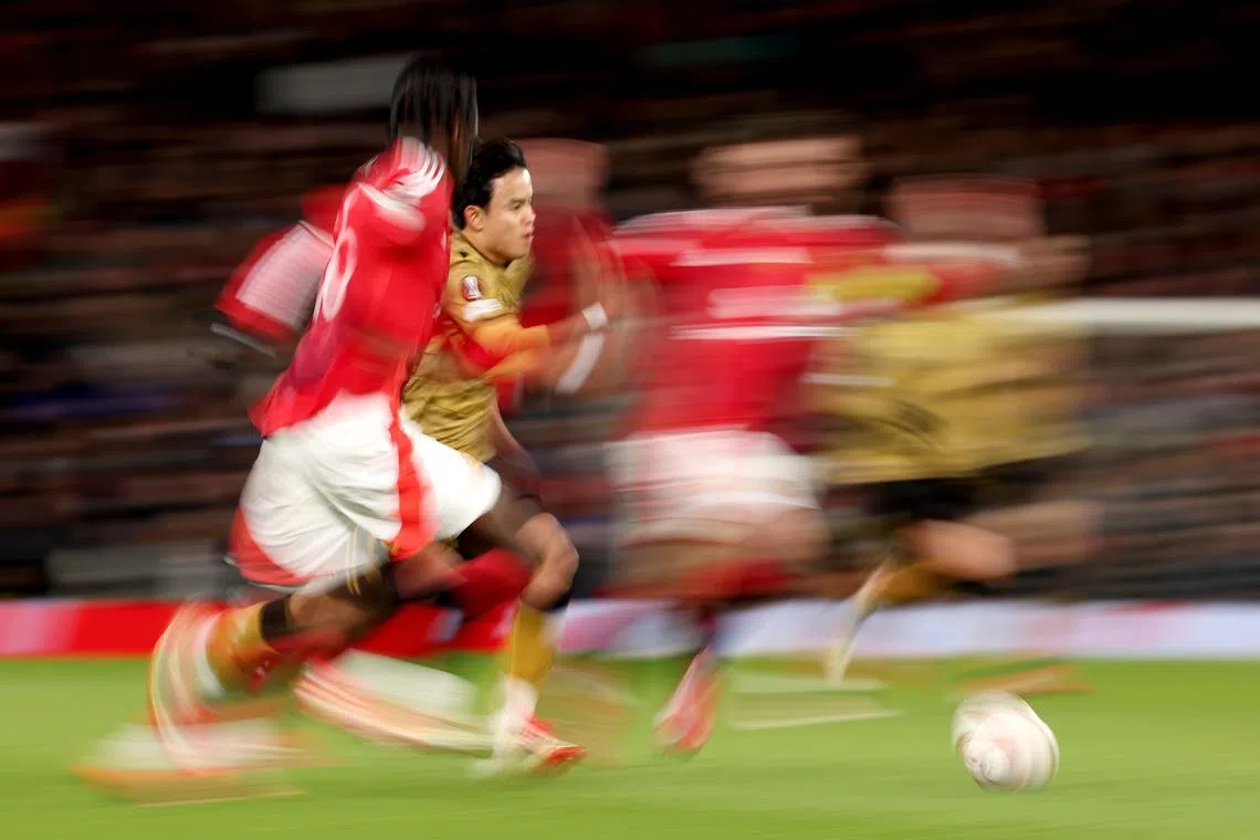 Takefusa Kubo of Sociedad in action during the UEFA Europa League match between Manchester United and Real Sociedad, in Manchester, on Mar 13, 2025.  