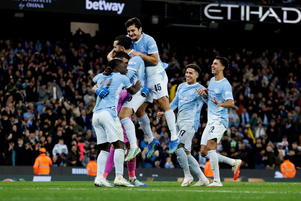 Manchester City goalkeeper Geronimo Rulli made two penalty saves as the League Cup holders won 4-3.
