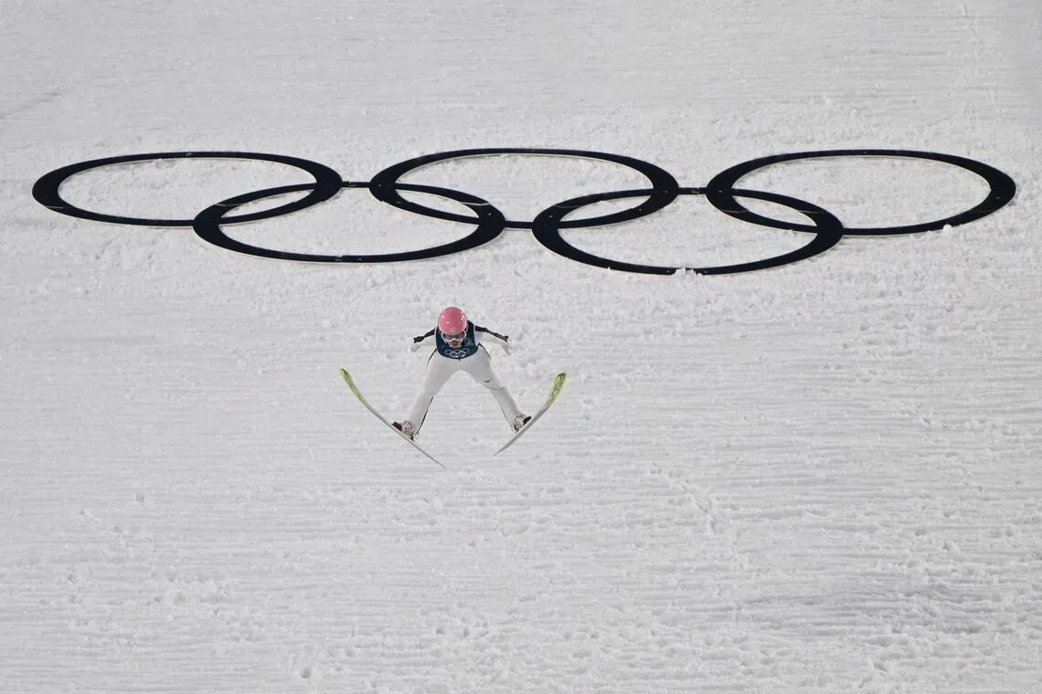 A female ski jumper competing at the Milano Cortina 2026 Winter Olympic Games on Feb 5. 