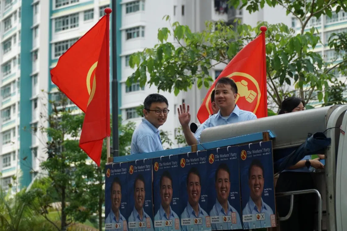 WP newcomer Andre Low (second from left) lost to labour chief Ng Chee Meng, 56, with 48.53 per cent of the vote in Jalan Kayu SMC.