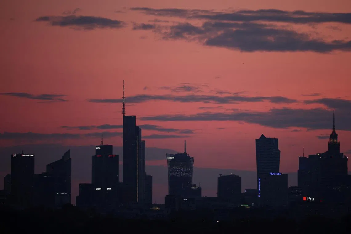 Skyline of skyscrapers is seen after sunset in Warsaw, Poland, June 28, 2023. REUTERS/Kacper Pempel/File Photo