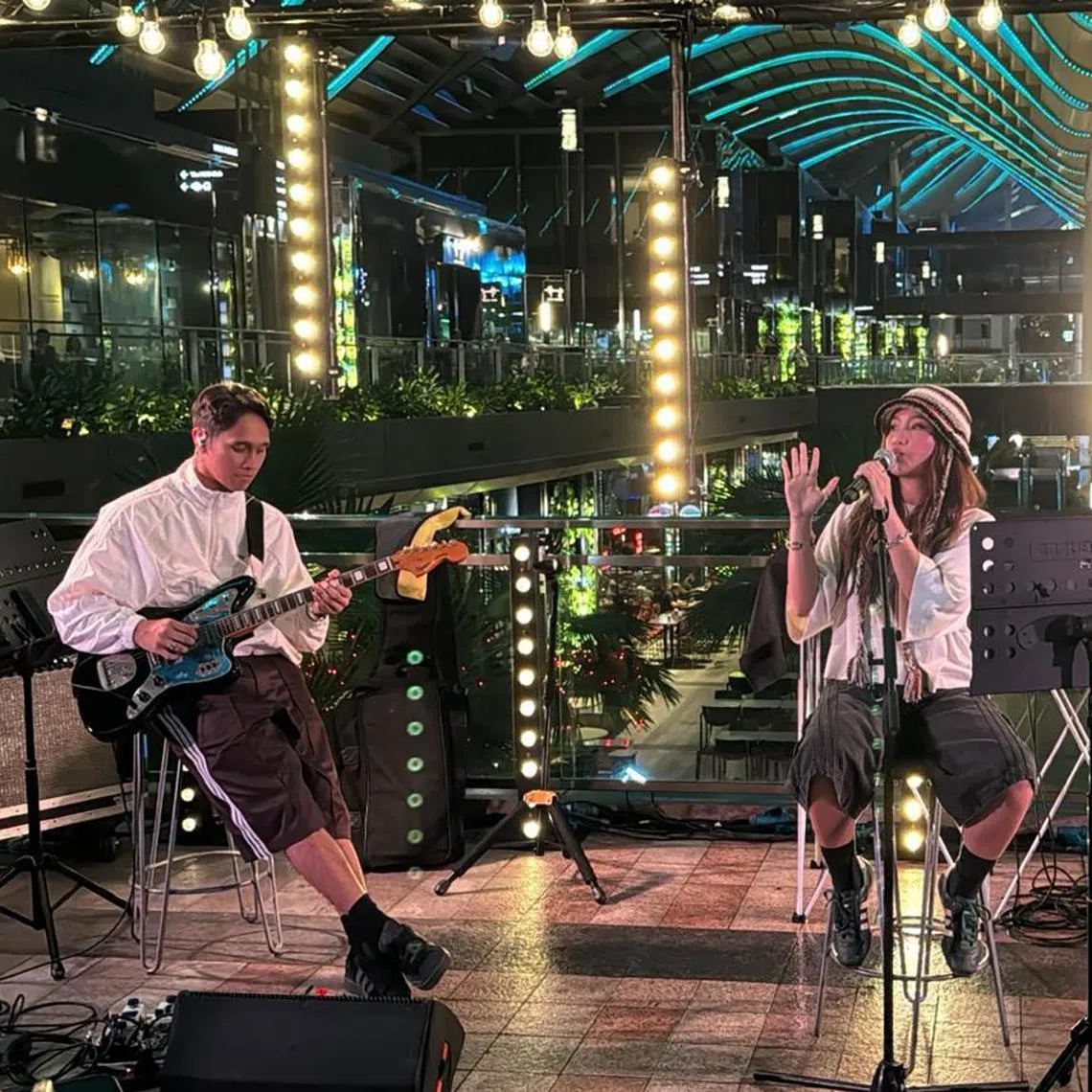 cwkhally - Khally performing at the South Beach Tower Fountain Plaza stage for District M in Oct 2024 with Zaki Yazid and Ruben Lee

PHOTO: Courtesy of YALLA Pte Ltd