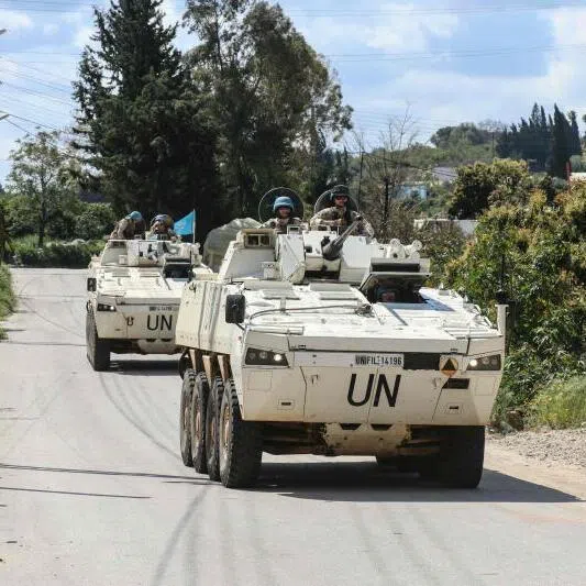 Members of the UN peacekeeping force in Lebanon patrolling the road of the southern Lebanese village of Tair Debba in armored vehicles, on April 12, 2026.