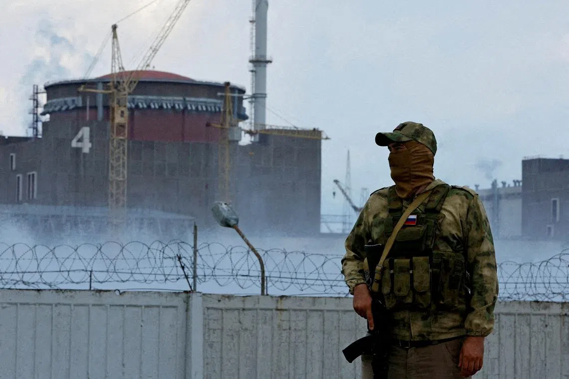 A Russia-allied serviceman guarding the Zaporizhzhia nuclear powerplant in Ukraine in August.