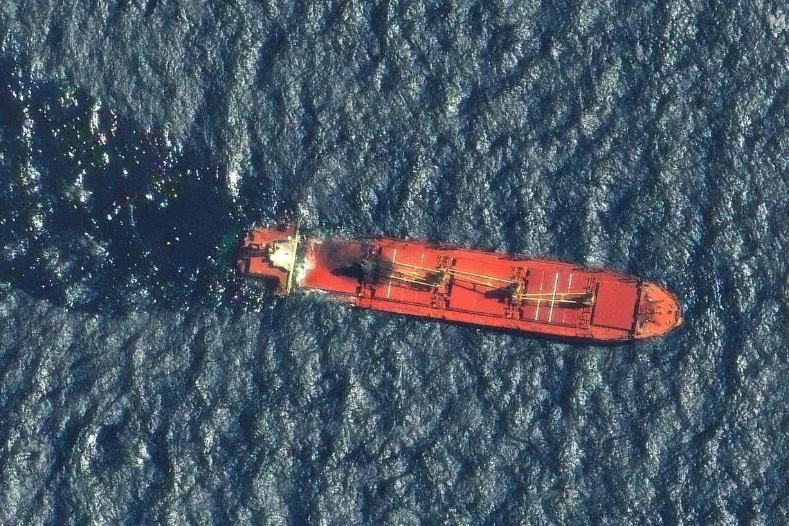 A satellite image shows the Belize-flagged and UK-owned cargo ship Rubymar, which was attacked by Yemen's Houthis, according to the U.S. military's Central Command, before it sank, on the Red Sea, March 1, 2024.  Maxar Technologies/Handout via REUTERS/FILE PHOTO