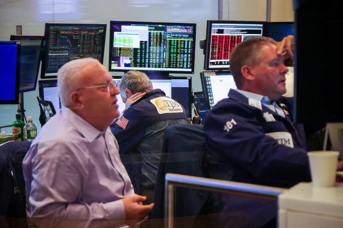 Traders working on the floor of the New York Stock Exchange, in New York City, on Sept 2.