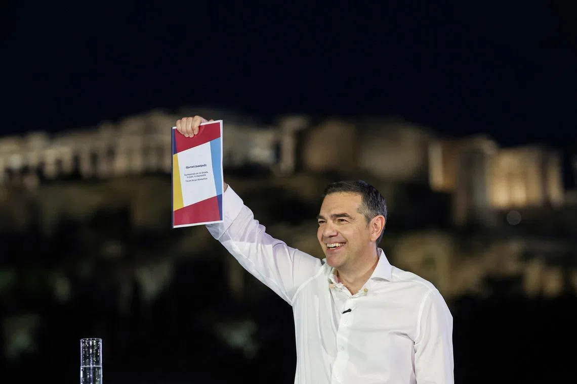 Greece's former Prime Minister Alexis Tsipras holds the founding declaration, during the official announcement of his new political party, ELAS-Greek Left Alliance, ahead of the 2027 parliamentary elections, in Athens, Greece, May 26, 2026. REUTERS/Louisa Gouliamaki